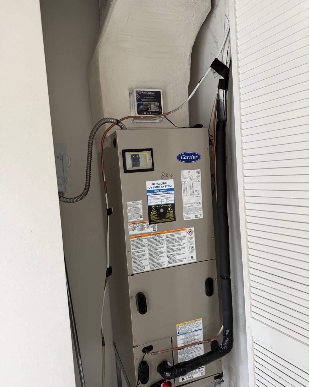 Air handler installed in a closet during an AC replacement